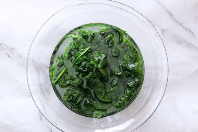 step 5: Boil the spinach and shock it in ice