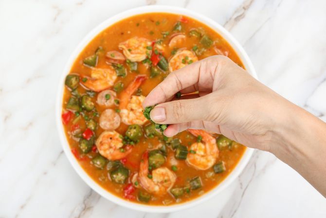 Sprinkle fresh herbs on top and serve Instant Pot Gumbo