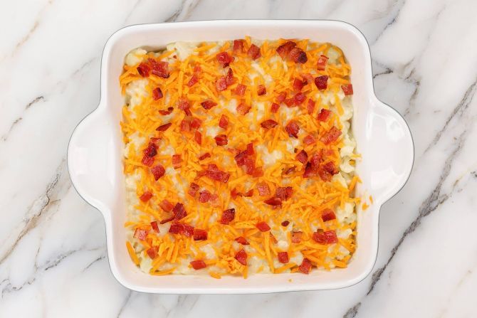 Sprinkle the cheese and bacon on top