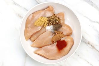 Toss chicken breasts with spice mix.