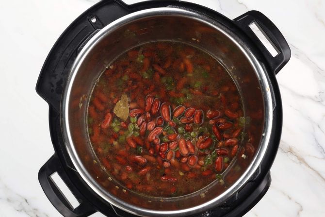 Step 4: Add beans and broth.
