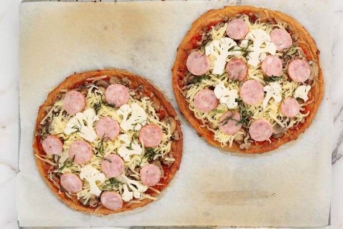 Step 7: Top the crust with the toppings.