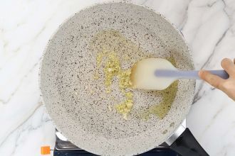 Sauté garlic and ginger in olive oil until fragrant