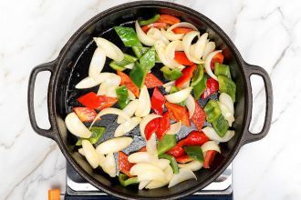 Step 2: In a cast-iron skillet, heat butter on medium heat and sauté the vegetables for 3 minutes. Remove to a bowl and set aside.