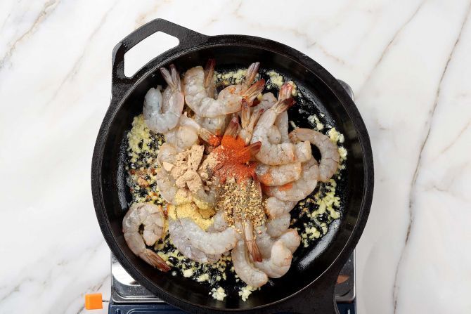 Sear the shrimp and add seasonings. Put aside.