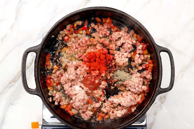 Add ground beef and spices to the skillet to brown.