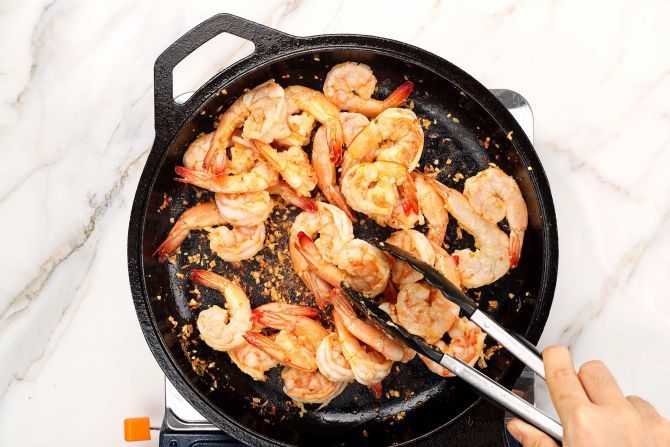 step 3: Sauté the aromatics and sear the shrimp.