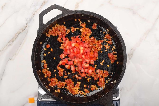 step 4: Add chopped tomatoes.
