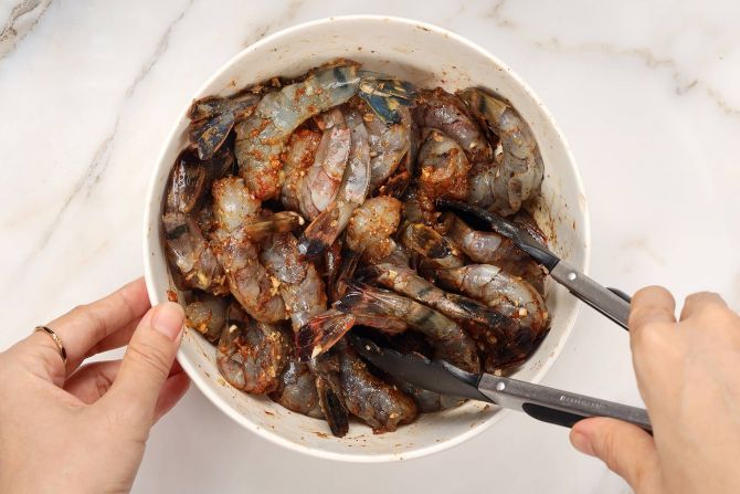 Step 2: Marinate the shrimp in the blackening seasoning.