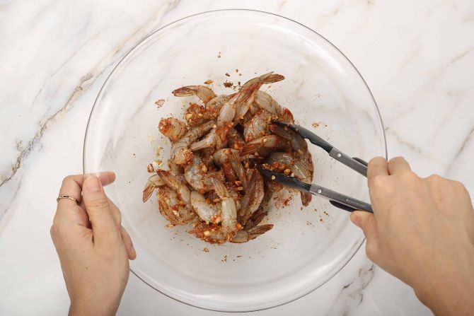 Step 1: Marinate the shrimp with the homemade Cajun seasoning.