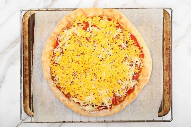 Step 10: Sprinkle with cheese.