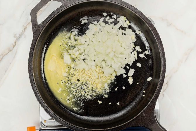 step 2: Cook the aromatics with oil and butter.