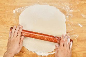 step 7: Divide the dough and roll out one half.
