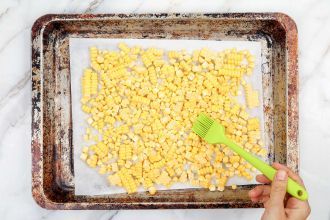 step 1: Spread the kernels and brush some oil or butter over top.