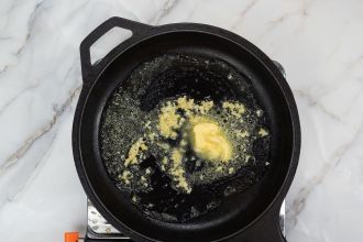 Step 2: Melt the butter and sauté the garlic.