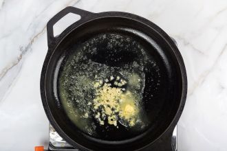 step 3: Stir the garlic in butter until very fragrant.