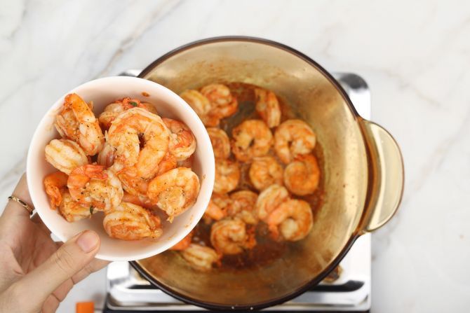 step 6: Save 1/3 of the cooked shrimp in a separate bowl for topping.