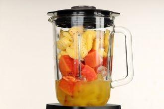Step 1: Combine the fruits, juice, and ice in a blender. Blend until smooth and creamy.